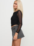   side view of model wearing Princess Polly Statuette Buckle Mini Skort Grey Mini Skirts 