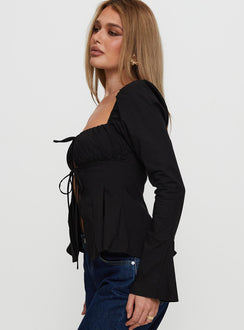 side view of model wearing Princess Polly Lilibette Tie Up Long Sleeve Top Black Full Sleeves Square Neck 
