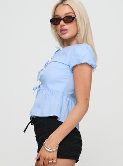side view of model wearing Princess Polly Life On Mars Top Blue Gingham Short Sleeves High Neck 