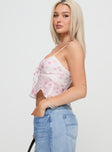 side view of model wearing Princess Polly Karta Top White / Pink Sleeveless V-Neck 