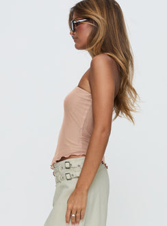 side view of model wearing Princess Polly Paxon Asymmetrical Top Beige Sleeveless straight 