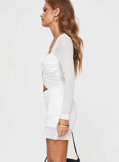 Matching set Mesh material, flower detail at front, split hem, ruching at sides Good stretch, fully lined skirt, lined bust