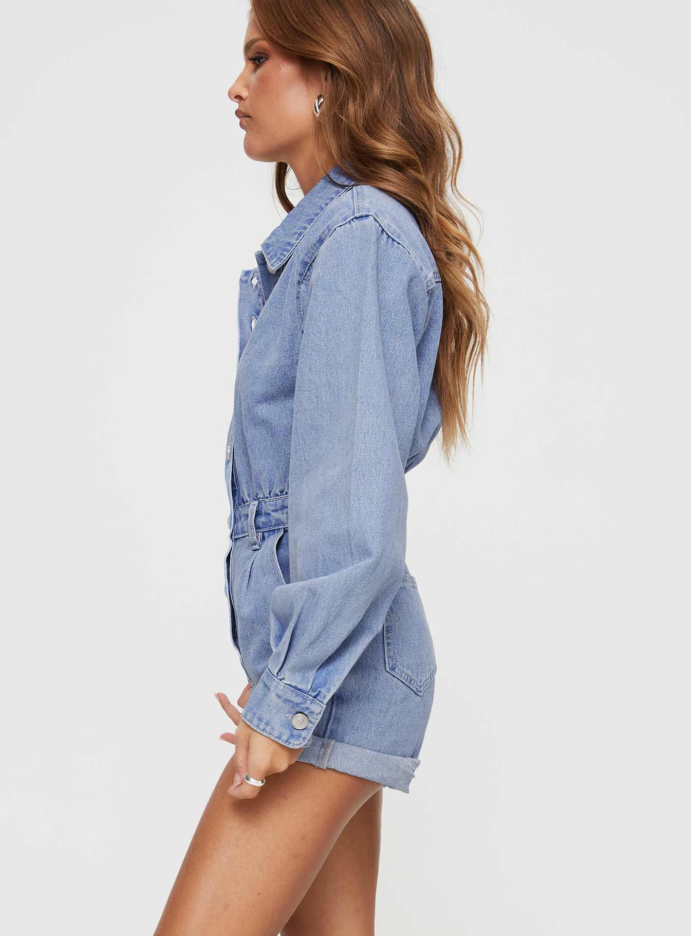 Denim romper Classic collar, button fastening, four pocket design, belt loops at waist