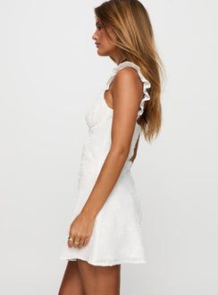 side view of model wearing Princess Polly Beacall Embroidered Mini Dress White V-Neck 