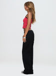 side view of model wearing Princess Polly Benicale Low Rise Cargo Pants Black Low Rise Pants 