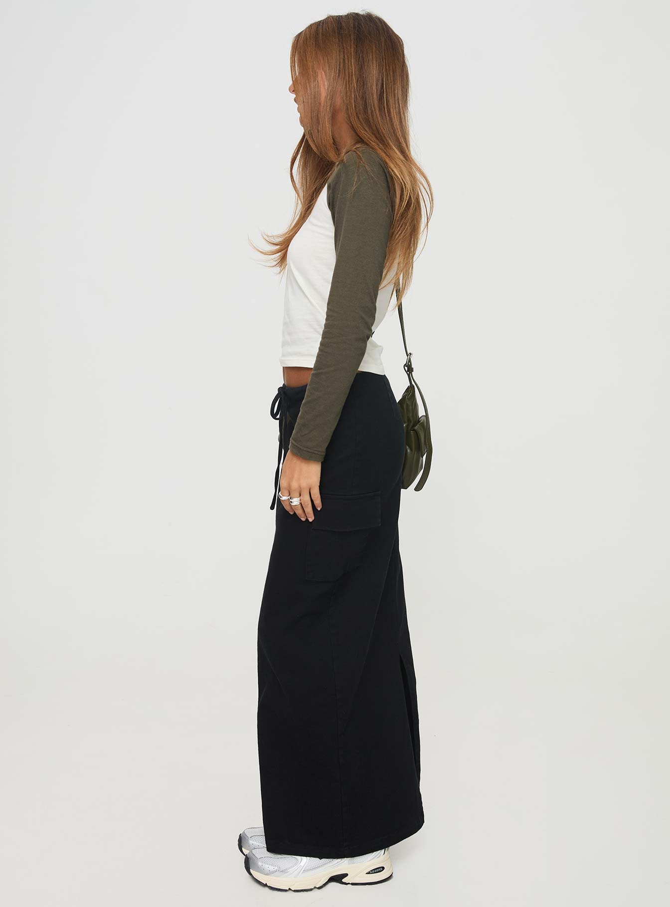   side view of model wearing Princess Polly My Girl Maxi Skirt Black Maxi 