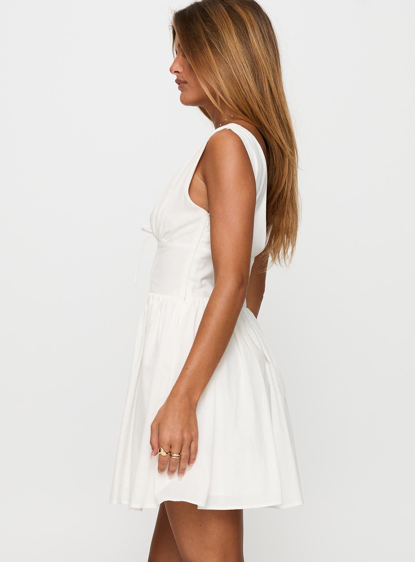 side view of model wearing Princess Polly Mattison Plunge Mini Dress White Plunger 