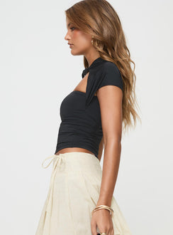 side view of model wearing Princess Polly Little Miss Top Black Short Sleeves High Neck 