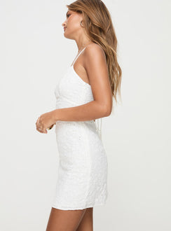 side view of model wearing Princess Polly Amaryn Mini Dress White V-Neck 