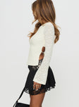   side view of model wearing Princess Polly Getaway Car Lace Mini Skirt Black Mini Skirts 