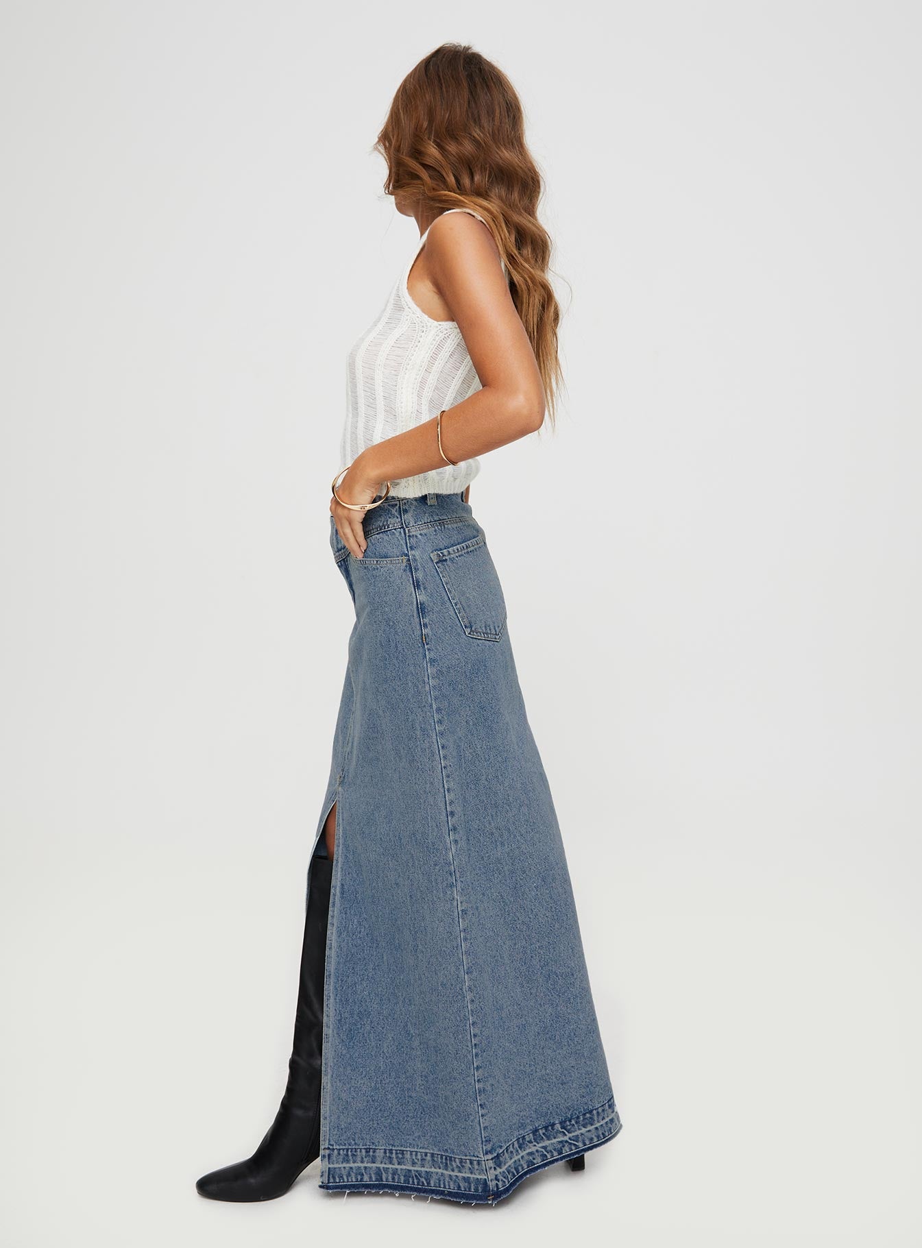 back view of model wearing Princess Polly Deneuve Denim Maxi Skirt Mid Wash Maxi 