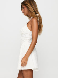 side view of model wearing Princess Polly Sweet Words Halter Mini Dress White Sweetheart Neckline 