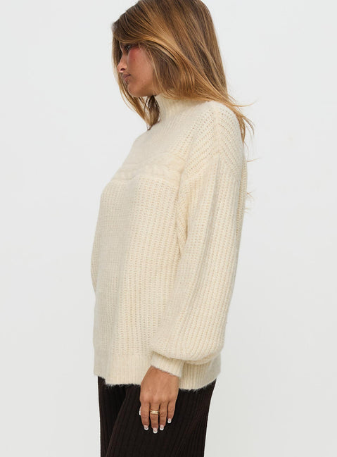 side view of model wearing Princess Polly Wistfully Funnel Neck Knit Sweater Cream Long 