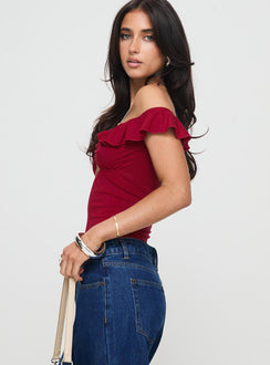 side view of model wearing Princess Polly Be Careful Off The Shoulder Bodysuit Red Short Sleeves V-Neck 