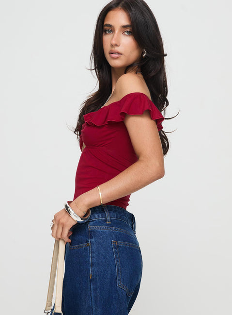 side view of model wearing Princess Polly Be Careful Off The Shoulder Bodysuit Red Short Sleeves V-Neck 