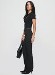 side view of model wearing Princess Polly Pagano Pinstripe Flare Pants Black High Waisted Pants 