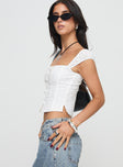 side view of model wearing Princess Polly Lyncher Top White Short Sleeves Square Neck 