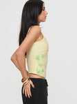 side view of model wearing Princess Polly Hoston Top Yellow Sleeveless Scoop Neck 