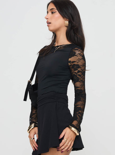 side view of model wearing Princess Polly Good Nights Lace Long Sleeve Bodysuit Black Full Sleeves Boat Neck 