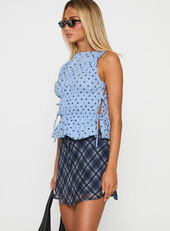   side view of model wearing Princess Polly Orellia Mini Skirt Blue Check Mini Skirts 