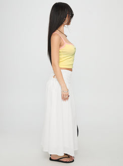   side view of model wearing Princess Polly Vence Ruched Maxi Skirt White Maxi 