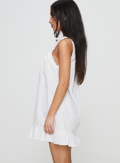 side view of model wearing Princess Polly Lalita Mini Dress White Crew Neck 