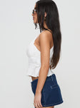 side view of model wearing Princess Polly Rozier Top White Sleeveless Crew Neck 