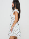 side view of model wearing Princess Polly True Lives Mini Dress White Floral Sweetheart Neckline 