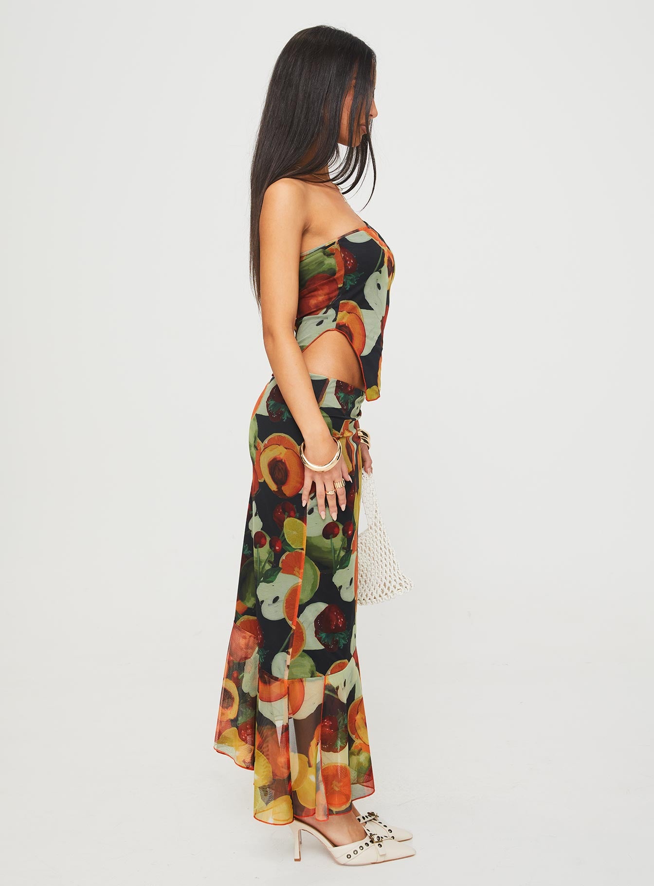   side view of model wearing Princess Polly Taila Maxi Skirt Multi Maxi 