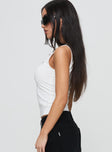 side view of model wearing Princess Polly Star Eyes Top White Sleeveless Crew Neck 