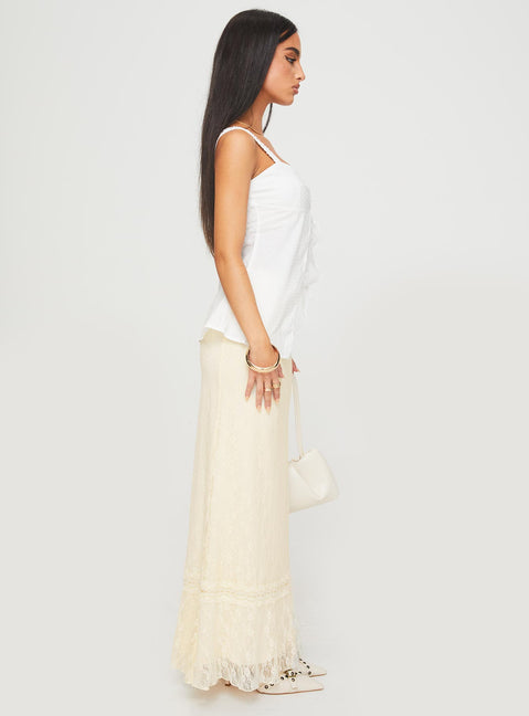   side view of model wearing Princess Polly Deanie Skirt Cream Maxi 