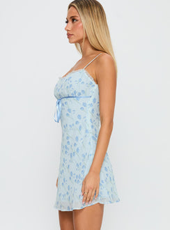 side view of model wearing Princess Polly Valencia Mini Dress Blue / Floral Scoop Neck 