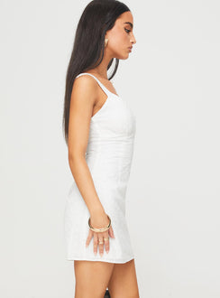 side view of model wearing Princess Polly Almuna Mini Dress White V-Neck 