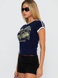 side view of model wearing Princess Polly North Shore Graphic Top Blue Short Sleeves Crew Neck 
