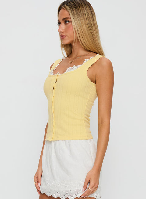 side view of model wearing Princess Polly Sole Purpose Lace Trim Top Yellow Sleeveless Scoop Neck 