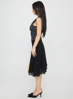   side view of model wearing Princess Polly Evanescence Asymmetrical Midi Skirt Black Midi Skirts 