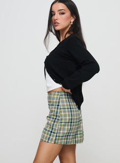   side view of model wearing Princess Polly Jacklin Mini Skirt Multi Check Mini Skirts 