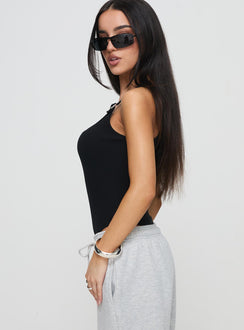 side view of model wearing Princess Polly Novelle Bodysuit Black Sleeveless Square Neck 