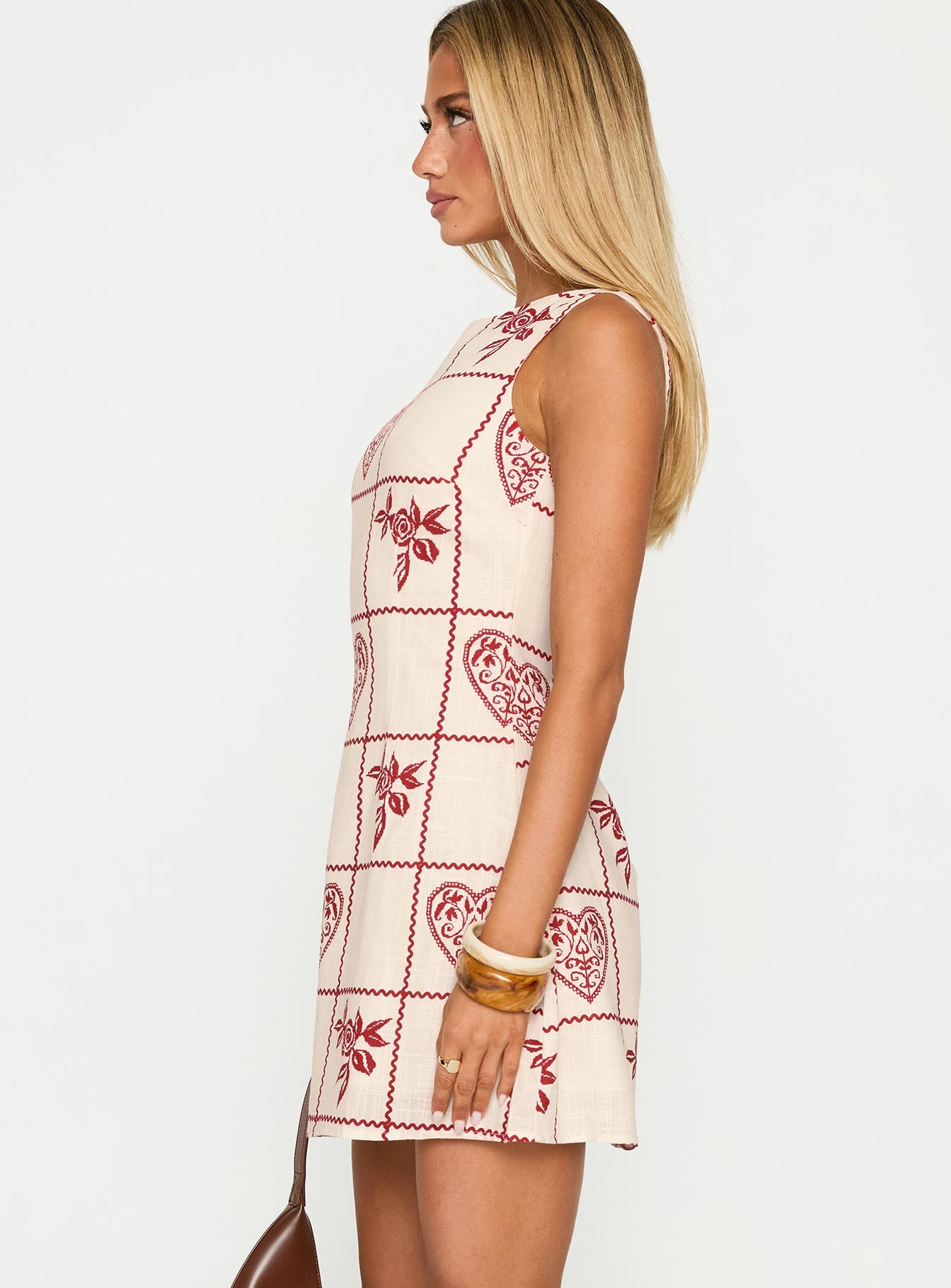 side view of model wearing Princess Polly Alfalfa Shift Mini Dress Red Floral Check Crew Neck 