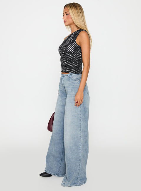 side view of model wearing Princess Polly Bowe Wide Leg Jeans Blue High Waisted 