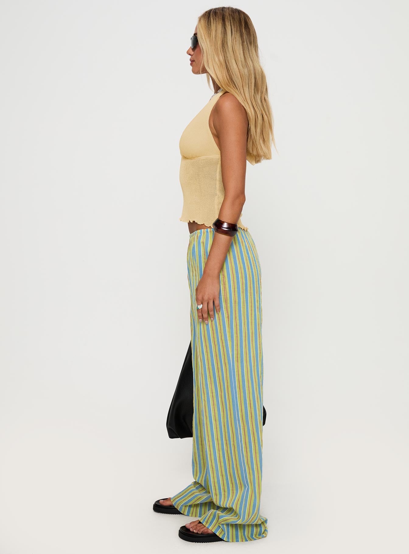 side view of model wearing Princess Polly Limestone Pants Multi Low Rise Pants 