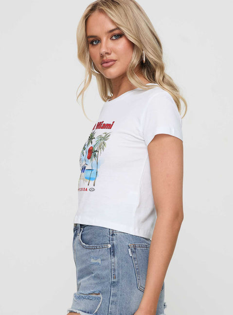 side view of model wearing Princess Polly Visit Miami Graphic Tee White Short Sleeves Crew Neck 
