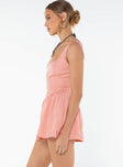 Silky romper Fixed shoulder straps, gathered waist, twin hip pockets, invisible zip fastening at back 