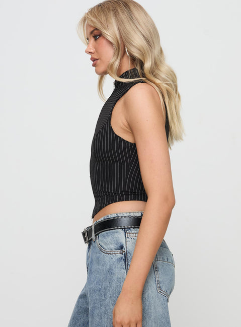 side view of model wearing Princess Polly Messa Top Black Pinstripe Sleeveless High Neck 