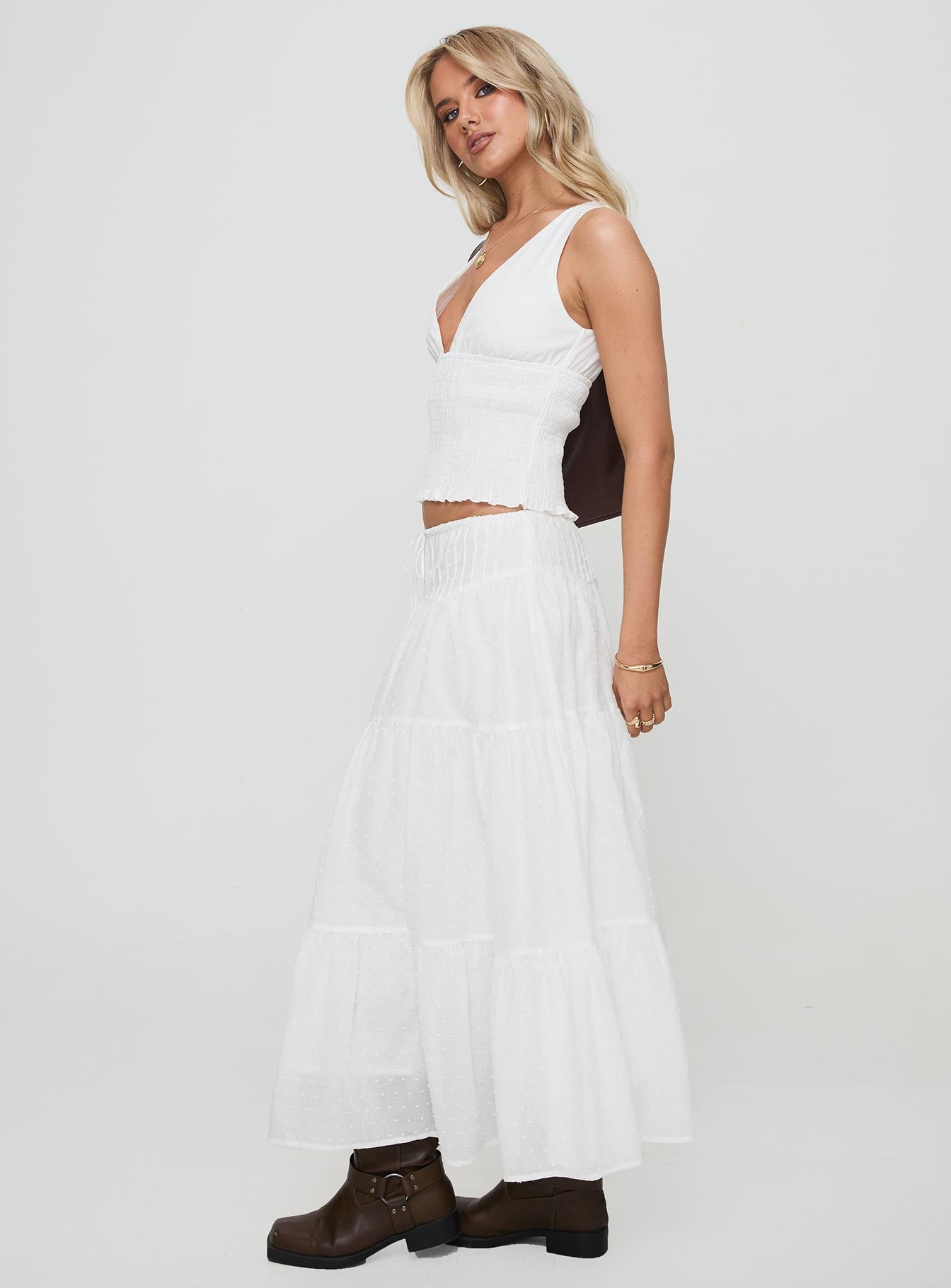   side view of model wearing Princess Polly Cherry On Top Maxi Skirt White Maxi 