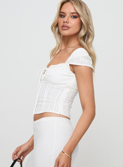 side view of model wearing Princess Polly Gilbert Top White Short Sleeves Square Neck 