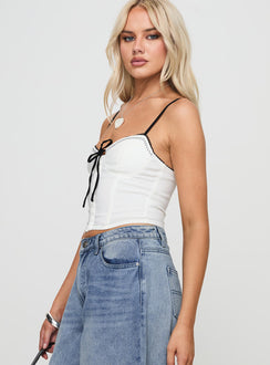 side view of model wearing Princess Polly Severas Top White Sleeveless Sweetheart 