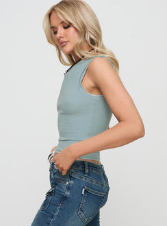 side view of model wearing Princess Polly Casado Top Blue Sleeveless Crew Neck 