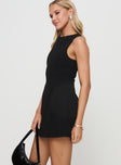 side view of model wearing Princess Polly Anse Mini Dress Black Petite Crew Neck 