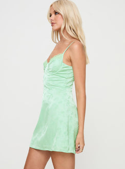 side view of model wearing Princess Polly Dear Me Mini Dress Sage Sweetheart Neckline 